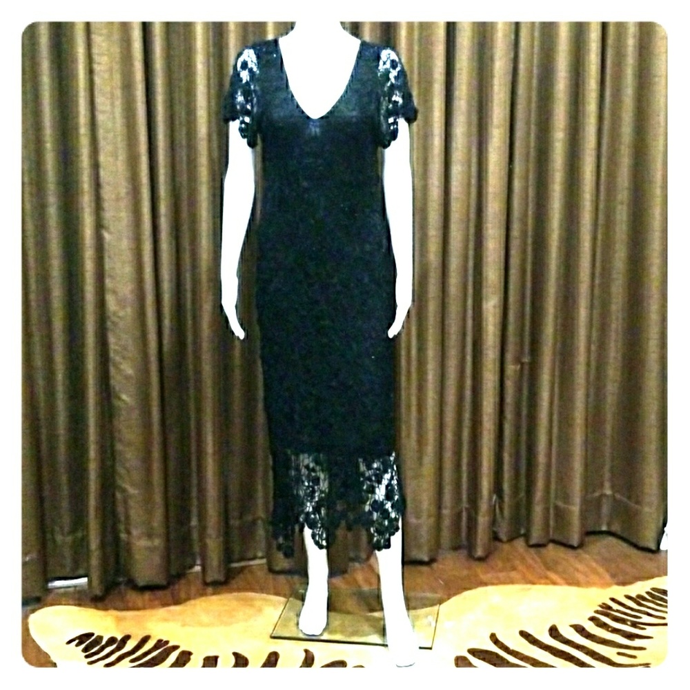 Beaded and crocheted black evening gown